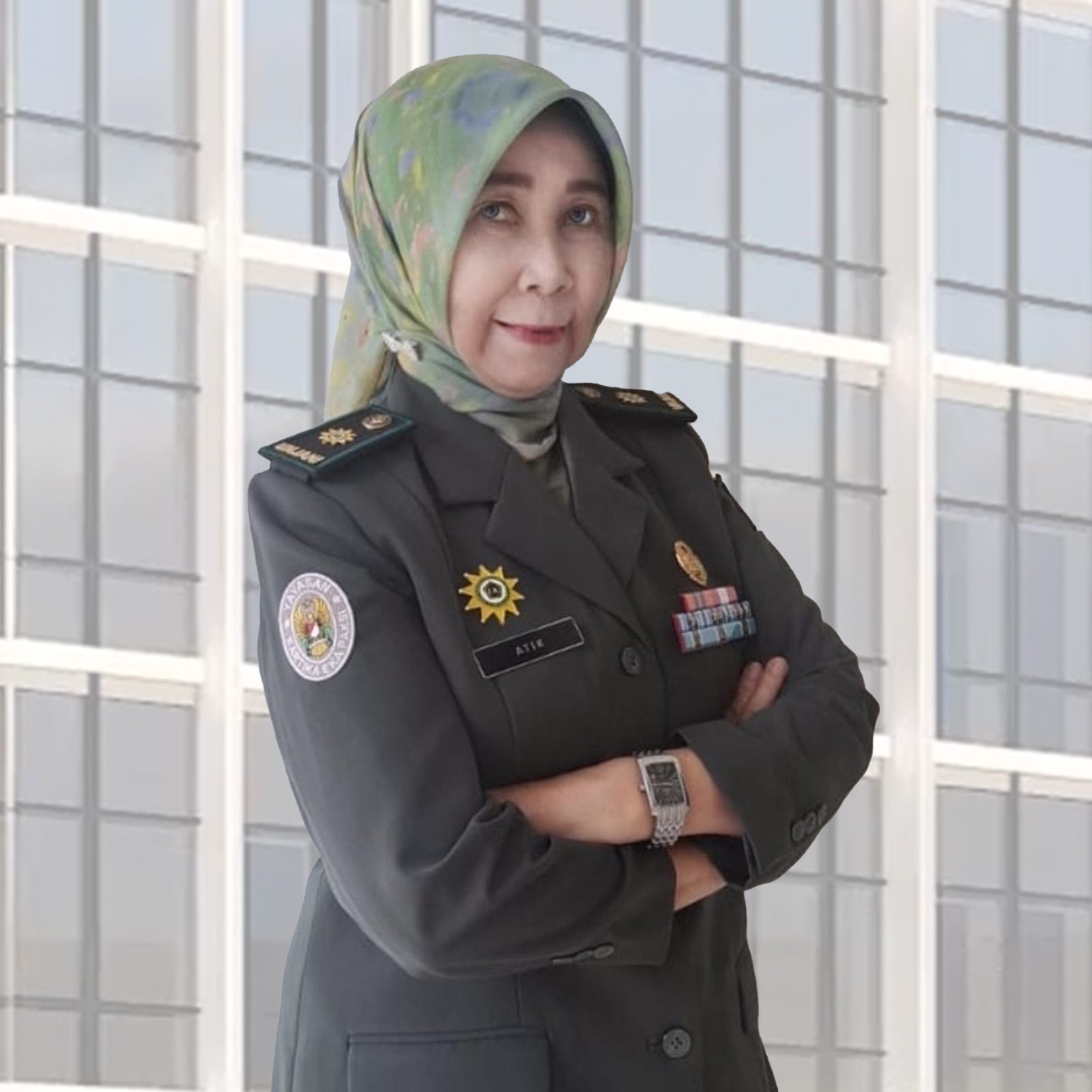 Dr. Atik Rochaeni, M.Si